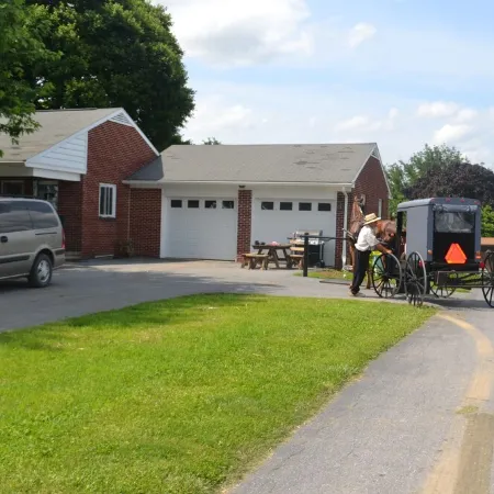 Sit on the Porch and Watch All the  Buggies Pass by