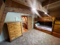 Rustic Riverside A-Frame Retreat: Secluded Charm.