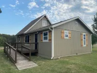 Cedar Lodge is quaint rustic lodge with modern amenities. Relaxing and warm! Hotels in Cedar County