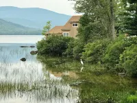 Panoramic Water and Mountains Views with Nature appearing daily.  Relax on