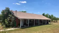 THE RED BRICK.  .  . A country retreat close to town