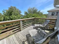 Charming Island Escape with Screened Porches and Spacious Yard - Inviting Retreat