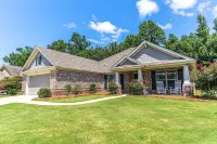 Modern Amenities with Spacious Patio and Playground - Elegant Oasis Hotels in Montgomery