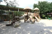 Family Garden Inn & Suites