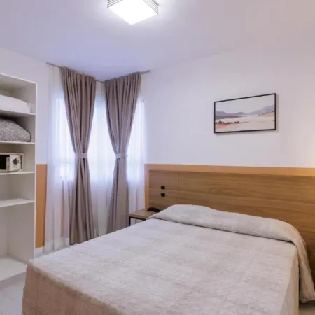 Le Village Flats e Hotel