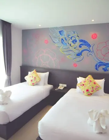 ห้องดีลักซ์ เตียงแฝด พร้อมวิวเมือง