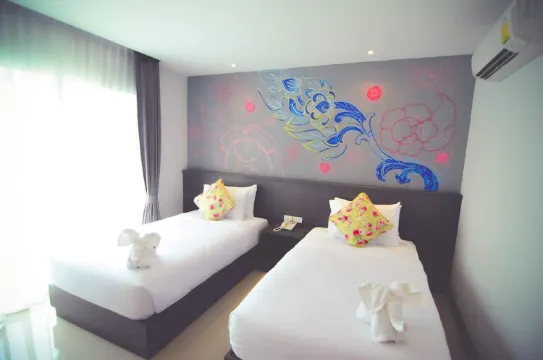 ห้องดีลักซ์ เตียงแฝด พร้อมวิวเมือง