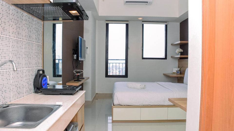 Comfy Studio Room at Evenciio Margonda Apartment