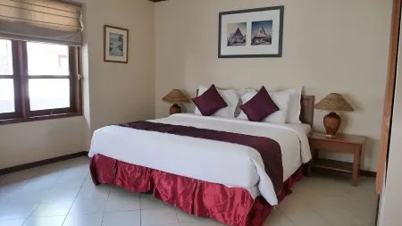 Tanjung Lesung Hotel Отели в г. Пандегланг