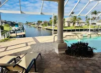 Ultimate Open Waterfront Home Sailboat Gulf Access  Heated Pool Hotels in Cape Coral
