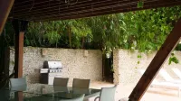 Chic luxury condo at Los Altos Casa de Campo Estadio Francisco A. Micheli附近的飯店