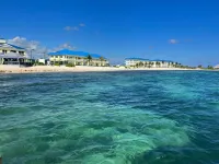 1st floor beachfront condo, just steps away from a private beach, beautiful view