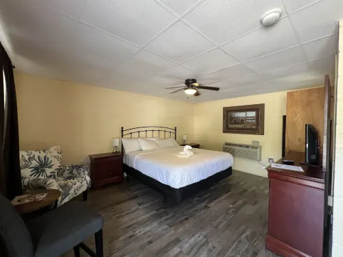 JI6, King Guest Room at the Joplin Inn at entrance to the resort by RedAwning - balcony