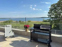 Luxurious Villa Möwengeflüster - 220sqm apartment for max. 8 guests + sauna by the lake Hotels in Muldestausee