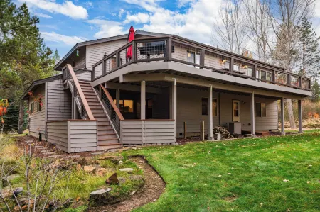 Private Boat Ramp Access Hot Tub Fire Pit Deck River Meadows by AvantStay