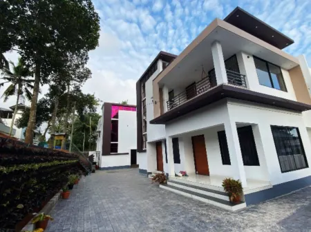 Urbane Cove 2: Furnished AC Apt Отели рядом с достопримечательностью «Mithrananthapuram Trimurti Temple»