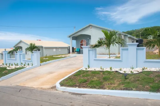 Luxury Overlooking Puerto Seco Beach @ Camelot Village Hotels in Discovery Bay