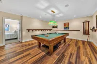 Go Jump In the Lake! Just Listed Custom Lakefront Home with Dock & Amenities!