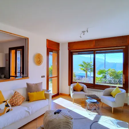 House in Luino with Green Garden and City Views