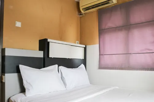 Best Deal 2BR Apartment Suites @Metro By Travelio