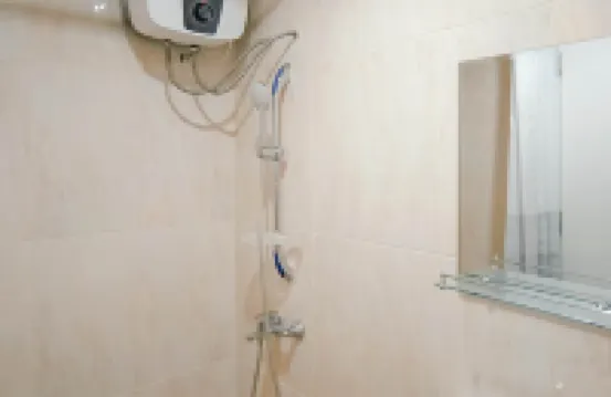 Basic Studio Apartment at Tamansari Skylounge Makassar By Travelio