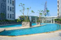 Spacious and Cozy 2BR at Tamansari Prospero Sidoarjo Apartment By Travelio