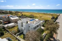 Garden& Rooftop Beachfront Apartment Hotels in 