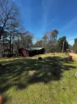 Quiet cabin in the woods w/ access to pools, river, & lakes in gated community!!