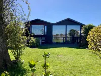 6 Pers. House Marijke with Winter Garden and Direct Access to the Lauwersmeer - que admiten mascotas