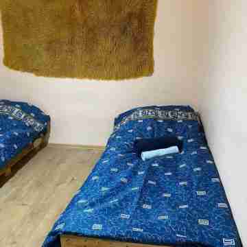 The apartment is in a cozy and quiet environment Rooms