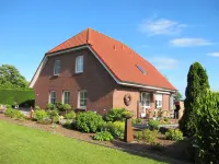 Rosenboom Hotels in der Nähe von ev. luth. Heilig-Kreuz Kirche Pakens/Hooksiel