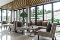 RedLiving Apartemen Eco Home - Wieg's Room Tower B Yashinoki Hôtels à : Sindang Jaya