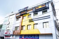 Kumar Hilife Hoteles cerca de Golden Lotus