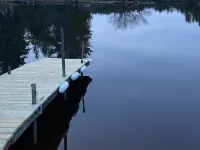 Cabin on the Eagle River Chain! Boat dock slip! Kayaks! Firewood for bonfires! Hotels in Lincoln