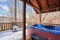 Bear Hugs cabin nestled in the woods.