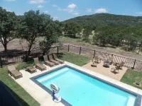 Spacious 5-bedroom house with a private pool on the golf course.
