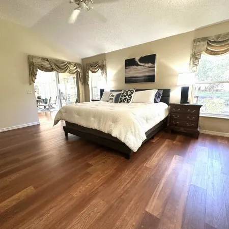 Great location..Climate-controlled lanai & NEW 2024 4-SEATER GOLF CART INCLUDED!
