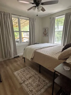 Charming 3 bedroom, 2 bath house with dock & outdoor spaces in Sunrise Beach.