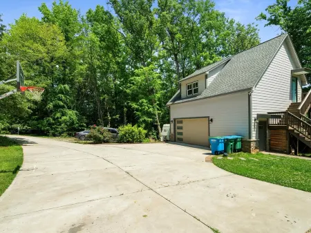 Studio above a detached garage away from main house on a private lot.