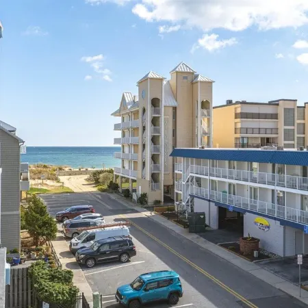 Newly Renovated Condo! Ocean View, Steps to beach, pool, private balcony,A/C