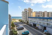 Newly Renovated Condo! Ocean View, Steps to beach, pool, private balcony,A/C