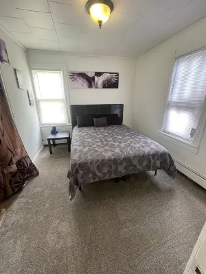 "Prime Location Stylish 1Bedroom  with Hot Tub Access, across street from Legion