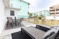 Classic Beach Cottage with front porch view of water