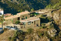 A charming family home with private pool in Cadaques with sea views.