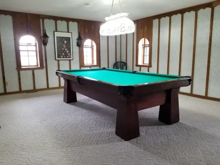 Historic Limestone House in park setting in Ozarks