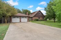 Beautiful Tudor Style home centrally located, and packed with amenities!