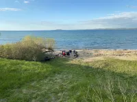 100 ft of private sandy beach on West Bay 3 miles from downtown TC.  Lic#2022-53 Elmwood Charter Township住宿飯店