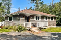 Secluded waterfront home with private dock, outdoor dining, firepit, WiFi & W/D Hotels near Red Roo Rescue