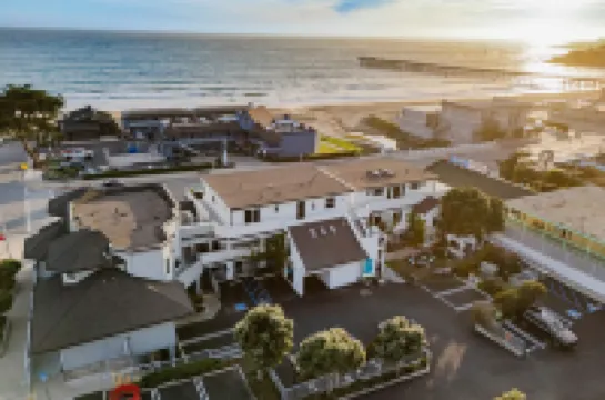 Charming Coastal Retreat with Firepit Lounge - Bright and Inviting Escape