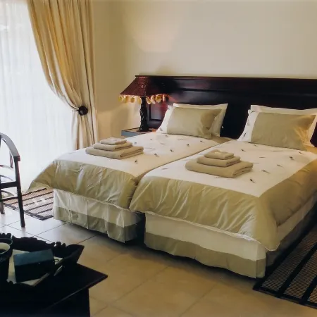 Falling Feather Inn Отели рядом с достопримечательностью «Торговый центр Zambezi Junction Mall»